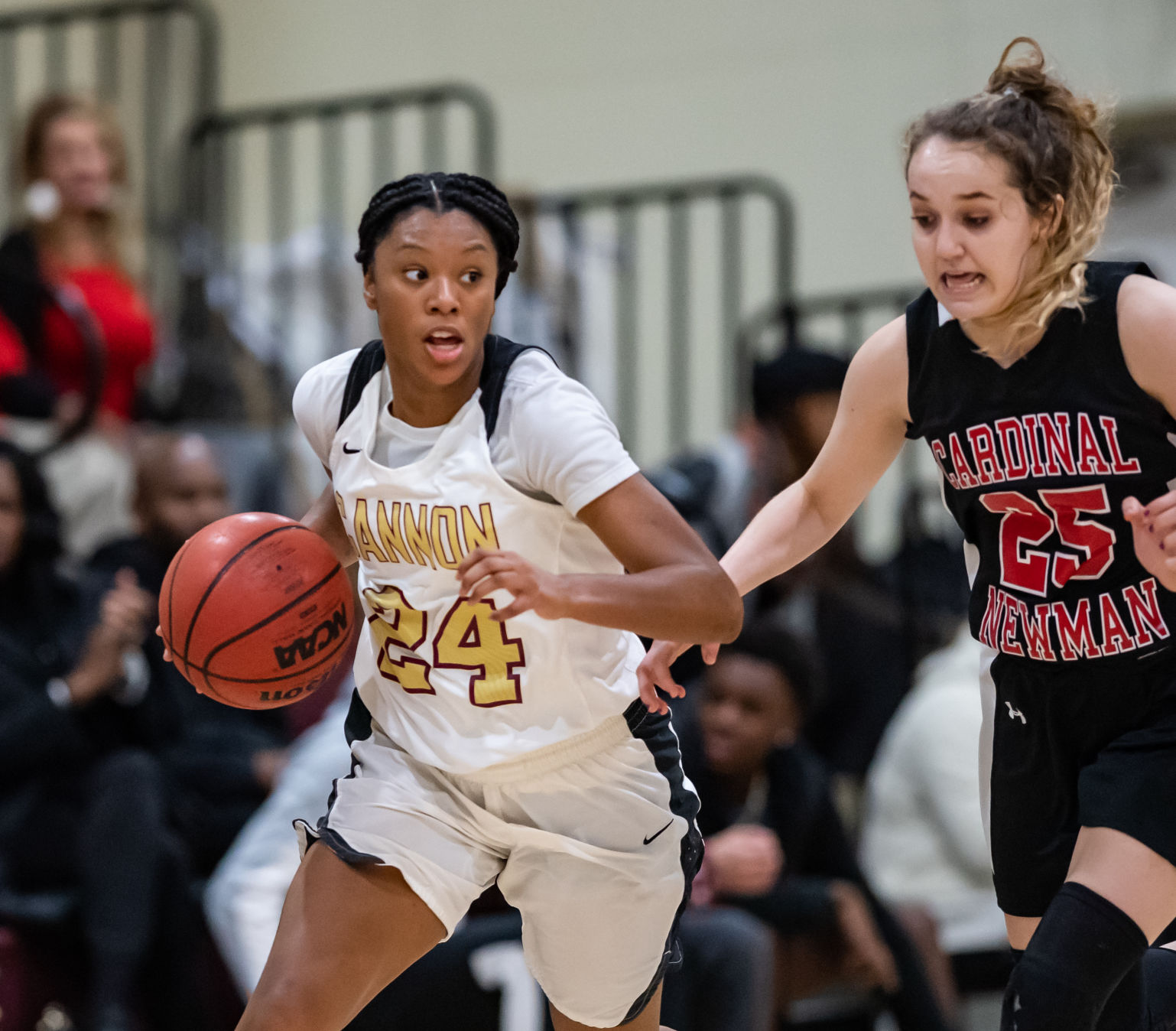 their home basketball game against Cardinal Newman